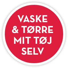 Jeg skal vaske og tørre mit tøj i den selvbetjente møntvask.